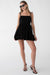 Bubble hem mini dress in black — main image