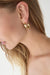 Organic curved hoop earrings in gold — main image