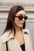Oval sunglasses in tortoise brown — main image