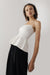 Knit peplum tube top in white — main image